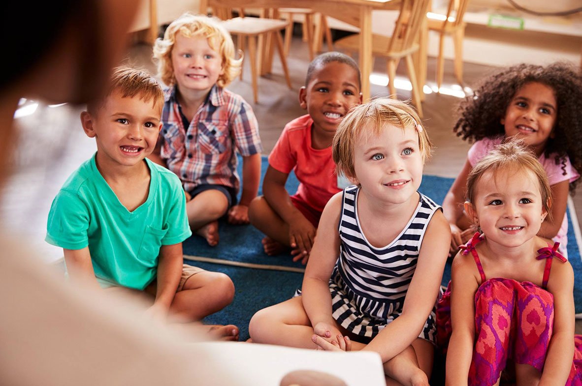 children listening to teacher