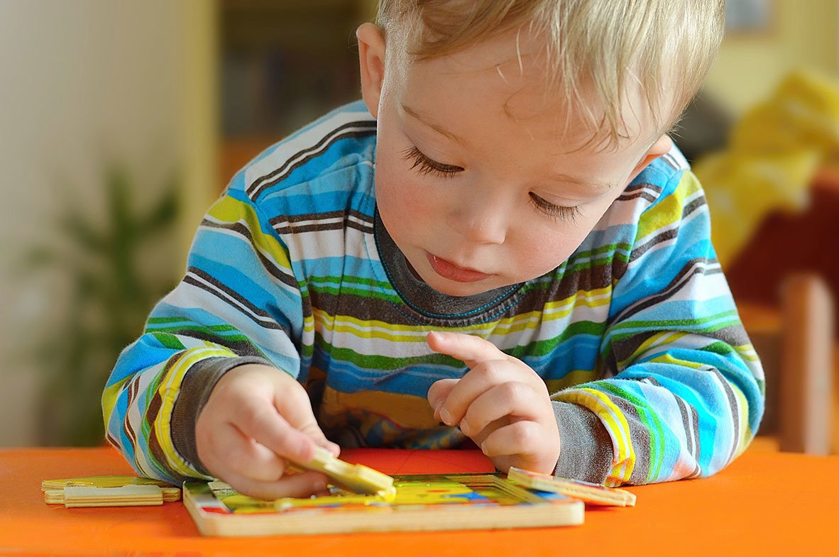 toddler playing with blocks